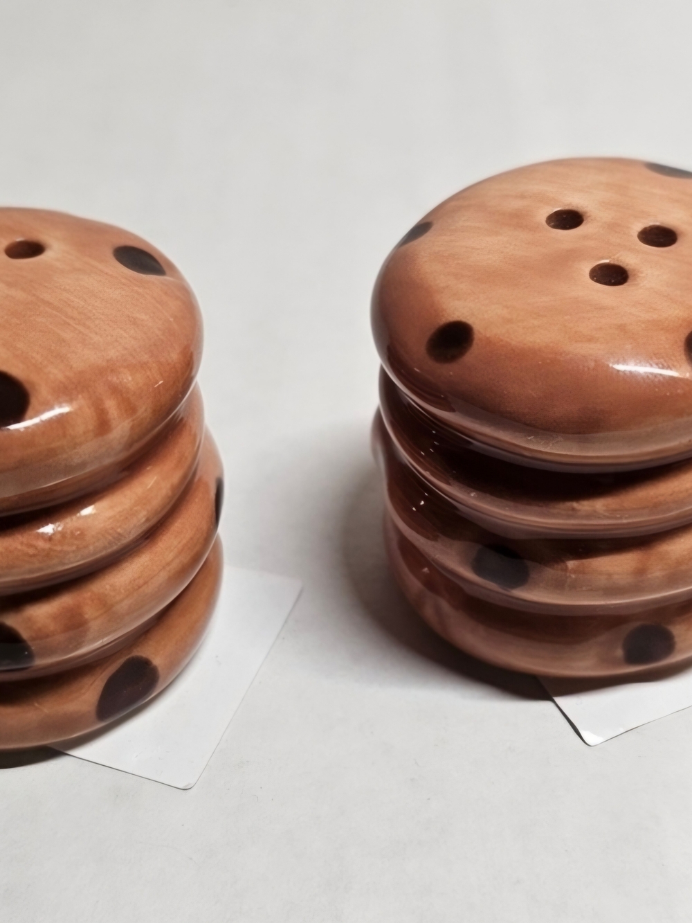 Miniature Salt And Pepper Shaker Shaped As Chocolate Chip Cookies.